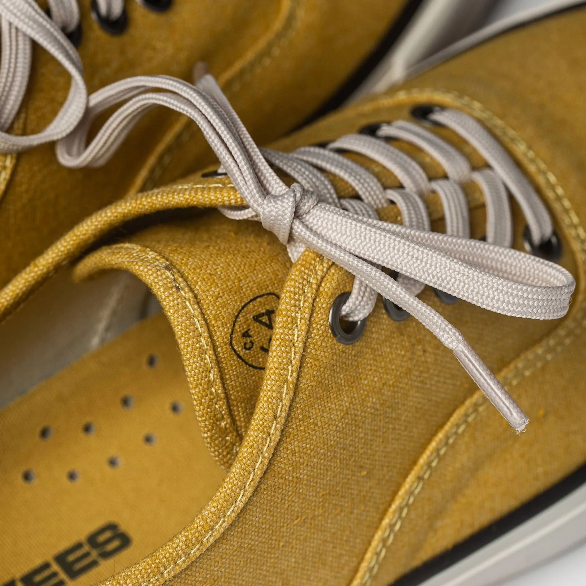 The Vista Sneaker in Gold Boss Duck